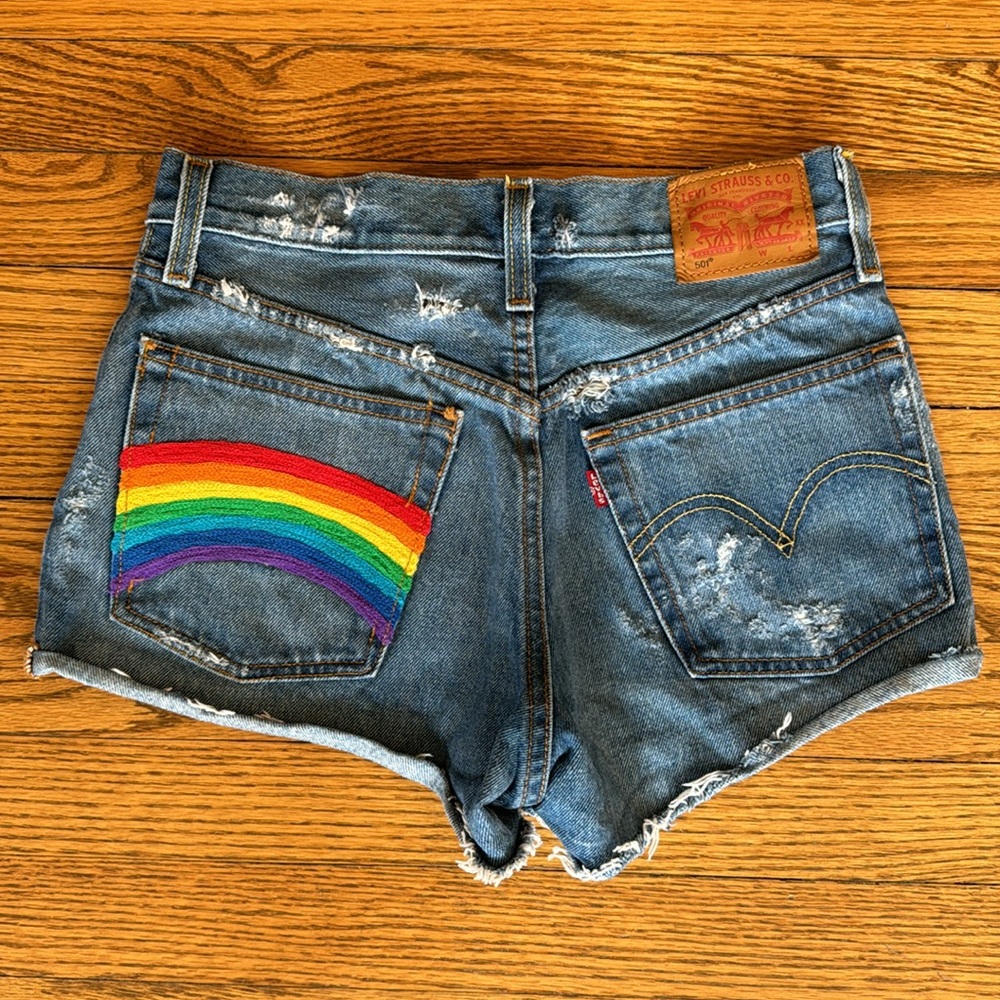 Levi’s Rainbow Embroidered Cutoffs Size 24